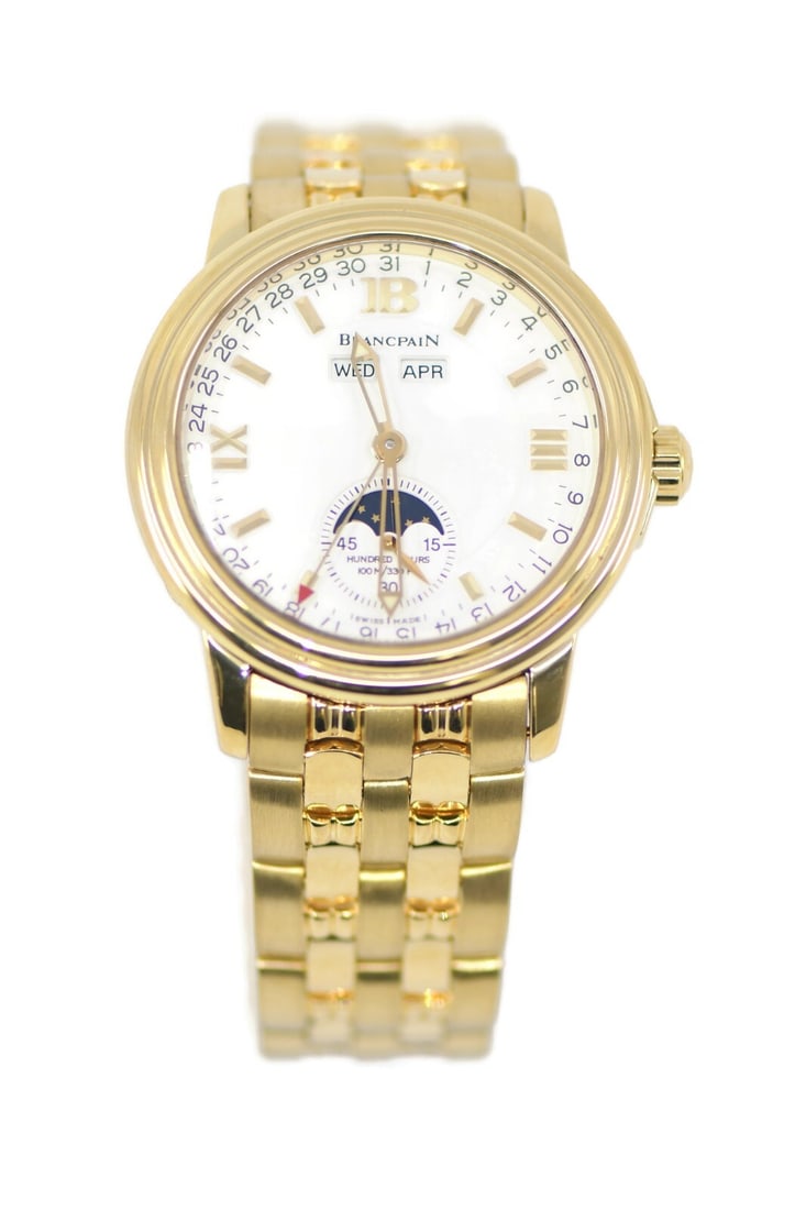 Blancpain Leman Moonphase 18K Yellow Gold Automatic Watch with Box: Blancpain Leman Moonphase 18K Yellow Gold Automatic Watch with Box Discover the exquisite Blancpain Leman Moonphase wristwatch, crafted in luxurious 18K yellow gold. This stunning timepiece features a