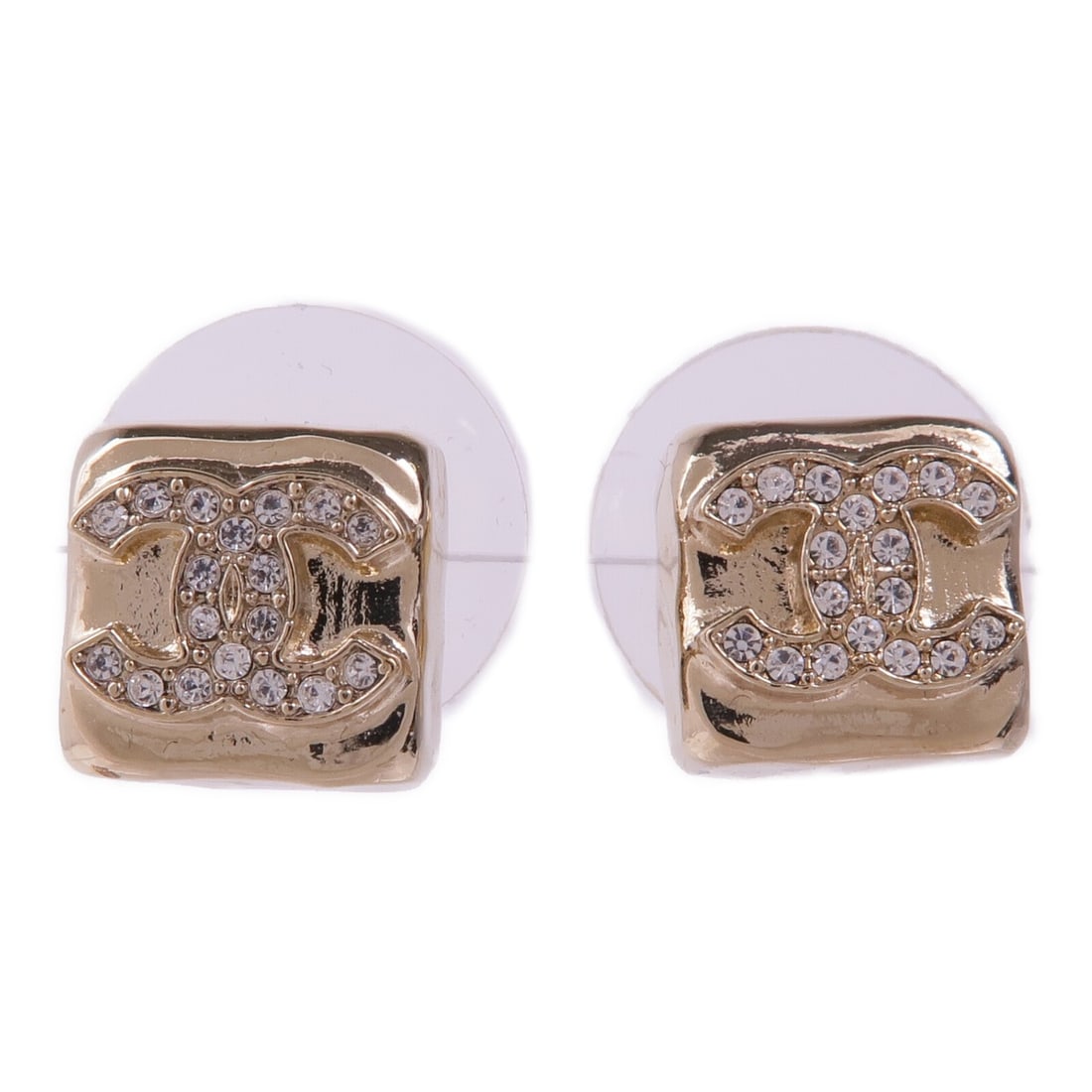 CHANEL Gold Metal CC Pierced Earrings Made in France: CHANEL Gold Metal CC Pierced Earrings Made in France Elevate your accessory game with these stunning CHANEL CC Earrings. Crafted in a luxurious gold finish, these pierced earrings showcase the iconic
