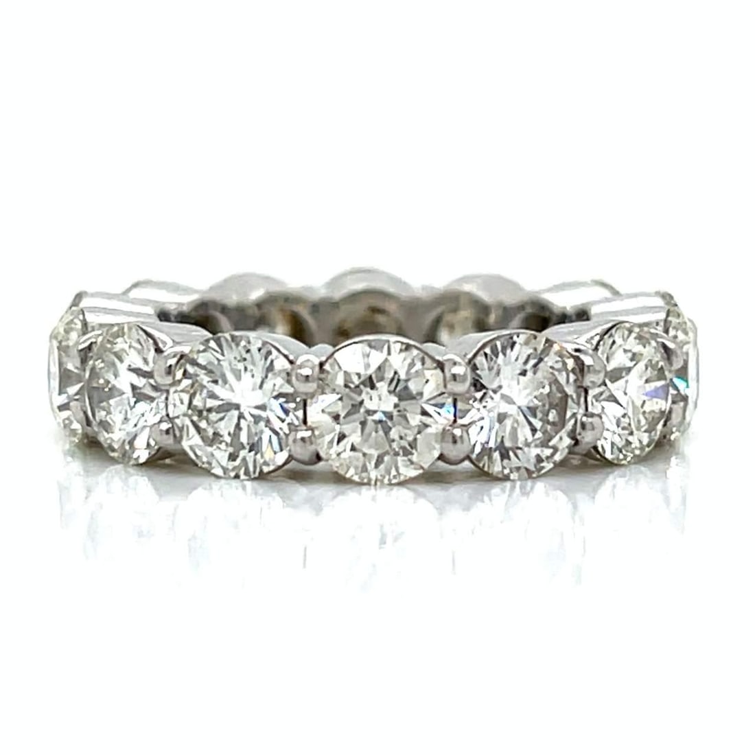 Platinum 7.26 Ct Diamond Eternity Ring 14 Diamonds H-I VS1-VS2: Platinum 7.26 Ct Diamond Eternity Ring 14 Diamonds H-I VS1-VS2 This stunning Platinum Eternity Ring showcases a total weight of 7.26 carats, featuring 14 exquisite diamonds. The diamonds are graded H-