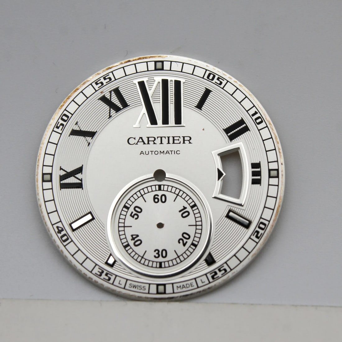 Cartier Calibre Silver Dial Roman Numerals for W7100037 W7100015: Cartier Calibre Silver Dial Roman Numerals for W7100037 W7100015 This luxurious Cartier Calibre silver dial is designed for select Cartier watch models, including W7100037 and W7100015. Featuring eleg