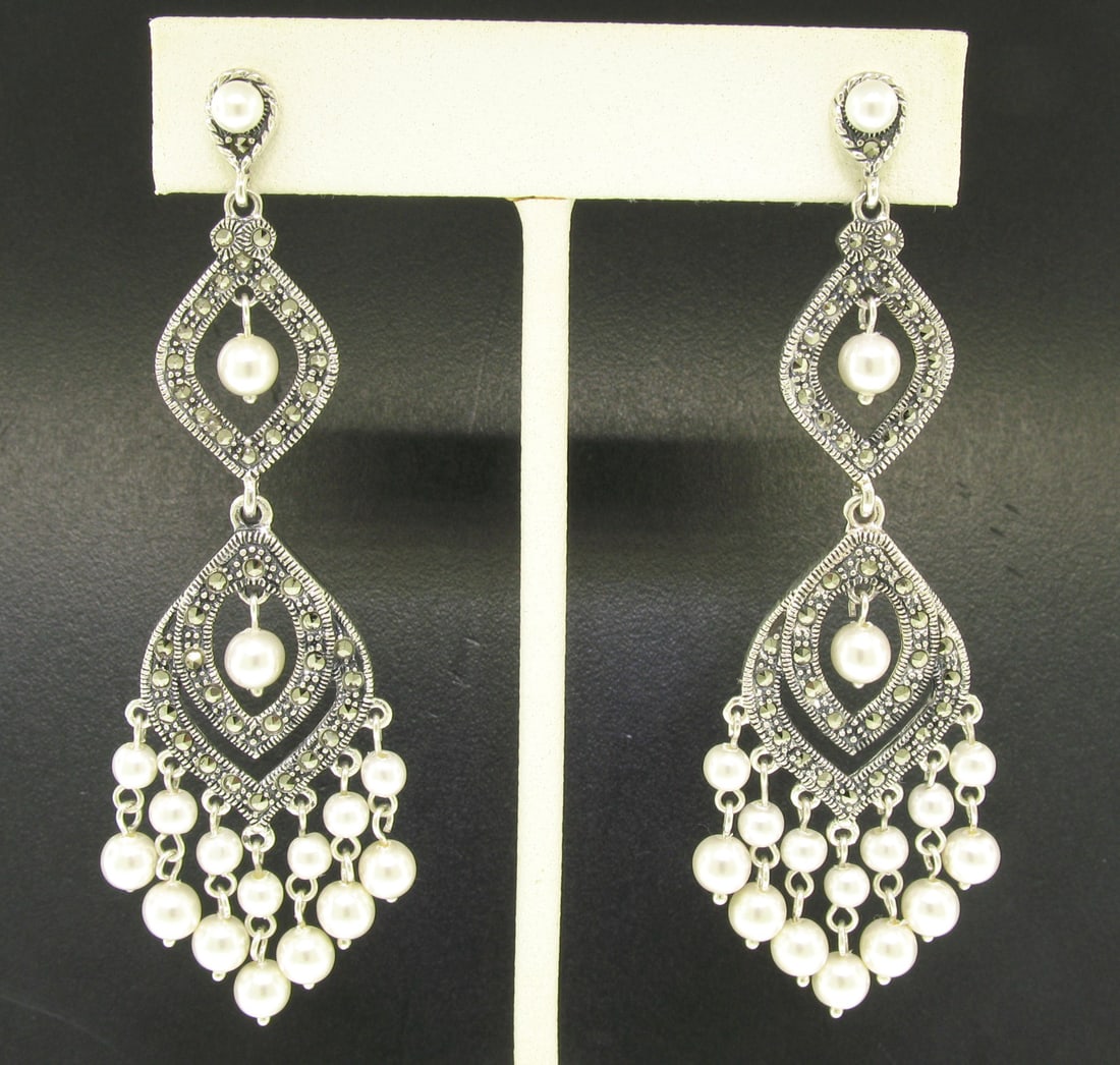 Unbranded Sterling Silver Marcasite Chandelier Pearl Earrings: Unbranded Sterling Silver Marcasite Chandelier Pearl Earrings Elevate your style with these stunning Marcasite Sterling Silver Long Dangle Chandelier Earrings, featuring exquisite white pearls. The de
