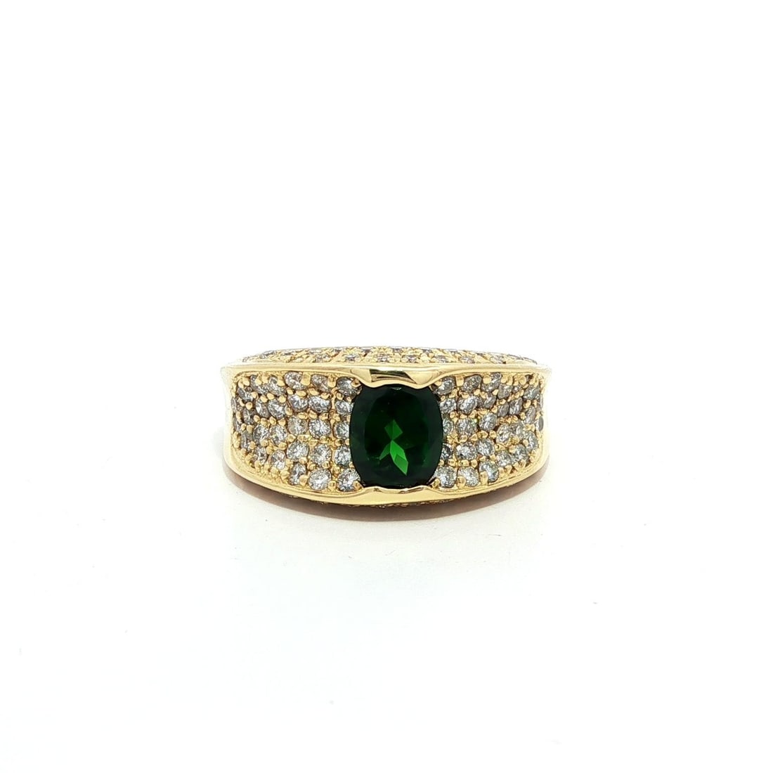 Elegant 18k Yellow Gold 2.23ctw Tsavorite Diamond Band Ring: Elegant 18k Yellow Gold 2.23ctw Tsavorite Diamond Band Ring This elegant band ring showcases a stunning 18k yellow gold setting, featuring a captivating natural oval cut tsavorite gemstone with a deep