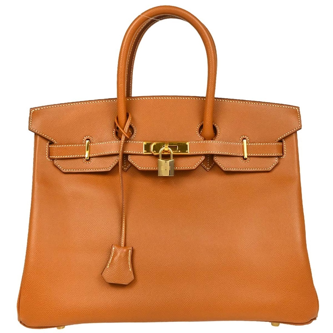 Hermes Gold Courchevel Birkin 35 Handbag with Lock Studs: Hermes Gold Courchevel Birkin 35 Handbag with Lock Studs The Hermes Gold Courchevel Birkin 35 Handbag is a luxurious satchel that showcases exquisite craftsmanship and timeless style. Constructed from