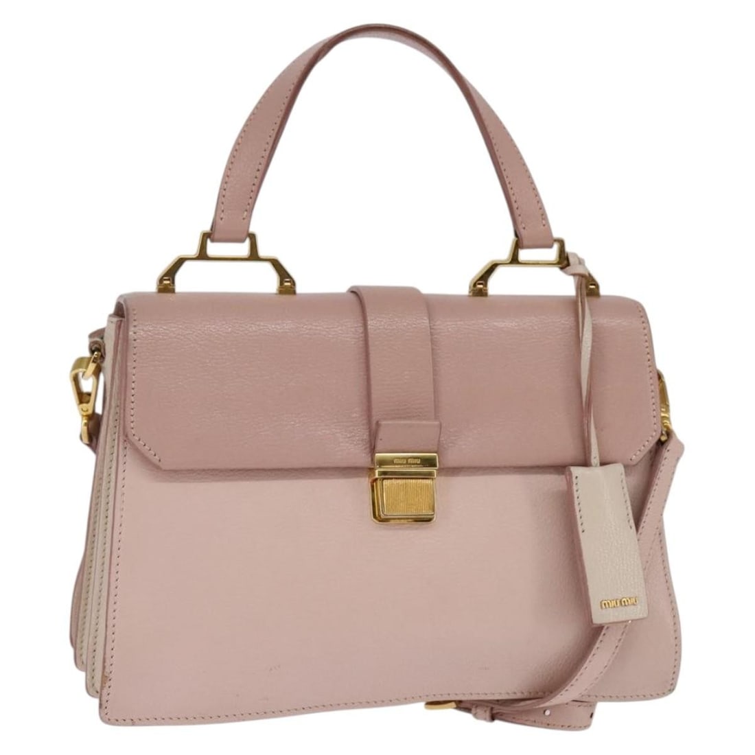 Miu Miu Leather 2-Way Handbag Pink Gold Made in Italy: Miu Miu Leather 2-Way Handbag Pink Gold Made in Italy This authentic Miu Miu handbag showcases a stylish blend of pink and gold leather, perfect for any fashion-forward individual. Crafted in Italy, t