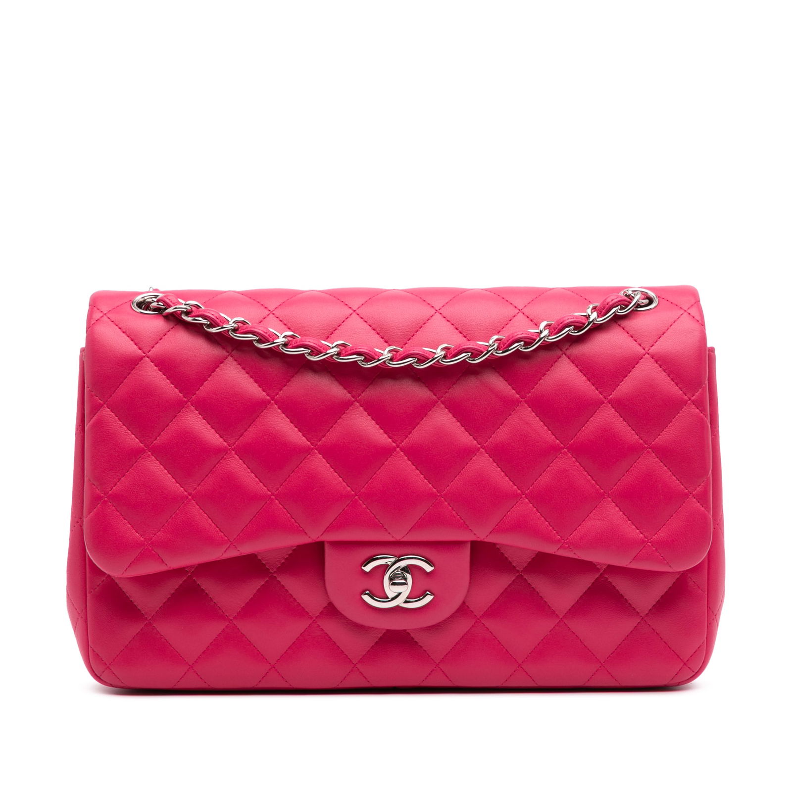 Chanel Pink Jumbo Classic Lambskin Double Flap Shoulder Bag: Chanel Pink Jumbo Classic Lambskin Double Flap Shoulder Bag This Chanel Jumbo Classic Double Flap shoulder bag is crafted from luxurious quilted lambskin leather in a stunning pink hue. It features el