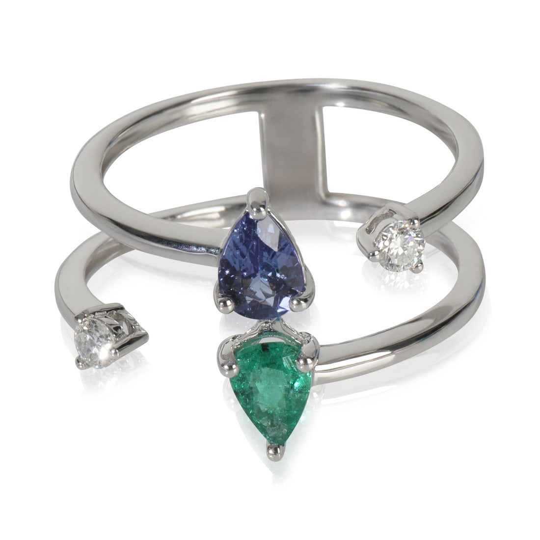 14K White Gold Emerald and Diamond Ring 0.33ct Unisex: 14K White Gold Emerald and Diamond Ring 0.33ct Unisex This exquisite ring showcases a stunning blend of colors and brilliance. The centerpiece is a pear-shaped emerald, weighing 0.33 carats, complemen