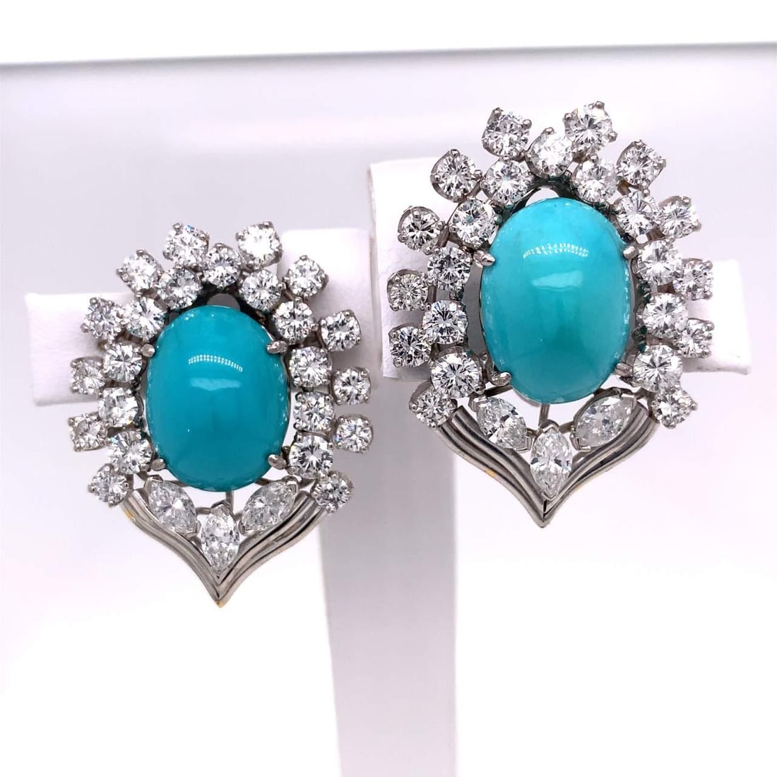 Platinum Turquoise Diamond Earrings 13.30 Ct D-F VVS-VS 1.5 in: Platinum Turquoise Diamond Earrings 13.30 Ct D-F VVS-VS 1.5 in Elevate your elegance with these stunning Platinum Real Turquoise and Diamond Earrings. These exquisite earrings feature a total of 46 di