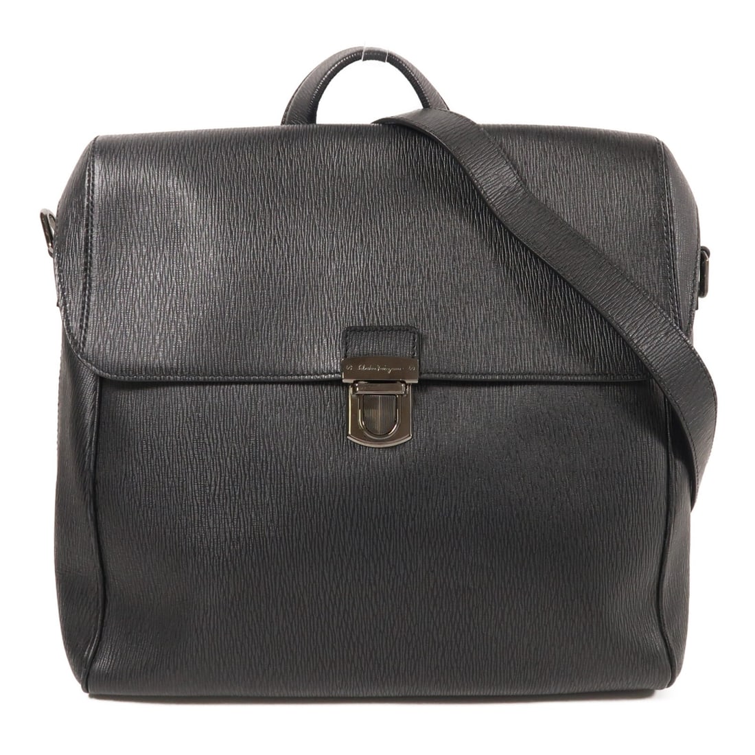 Salvatore Ferragamo Black Calfskin Leather Shoulder Bag Made in Italy: Salvatore Ferragamo Black Calfskin Leather Shoulder Bag Made in Italy This stylish Salvatore Ferragamo shoulder bag is crafted from luxurious black calfskin leather, offering a sophisticated look for