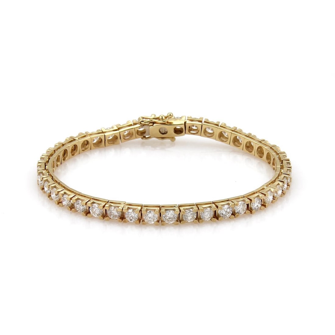 Elegant 14k Yellow Gold Tennis Bracelet 5.60 Carat Diamond Square Link: Elegant 14k Yellow Gold Tennis Bracelet 5.60 Carat Diamond Square Link This stunning Tennis Bracelet is expertly crafted from 14k yellow gold with a high polished finish. It features 40 prong set roun