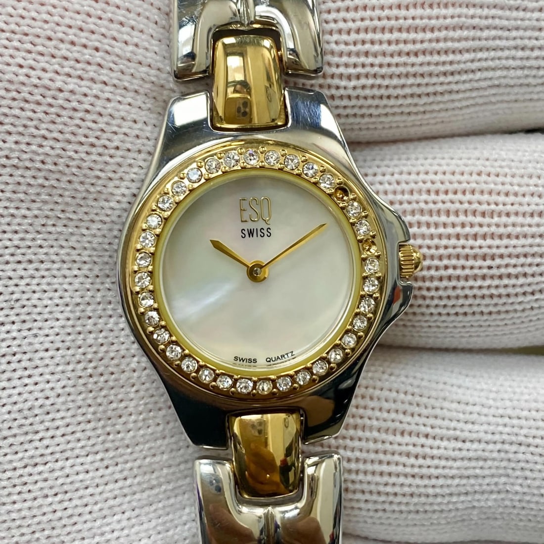 ESQ Movado Contessa Quartz Ladies Watch MOP Dial Two Tone Steel: ESQ Movado Contessa Quartz Ladies Watch MOP Dial Two Tone Steel This ESQ Movado Contessa wristwatch combines elegance with casual style, featuring a striking mother of pearl dial set in a polished sta