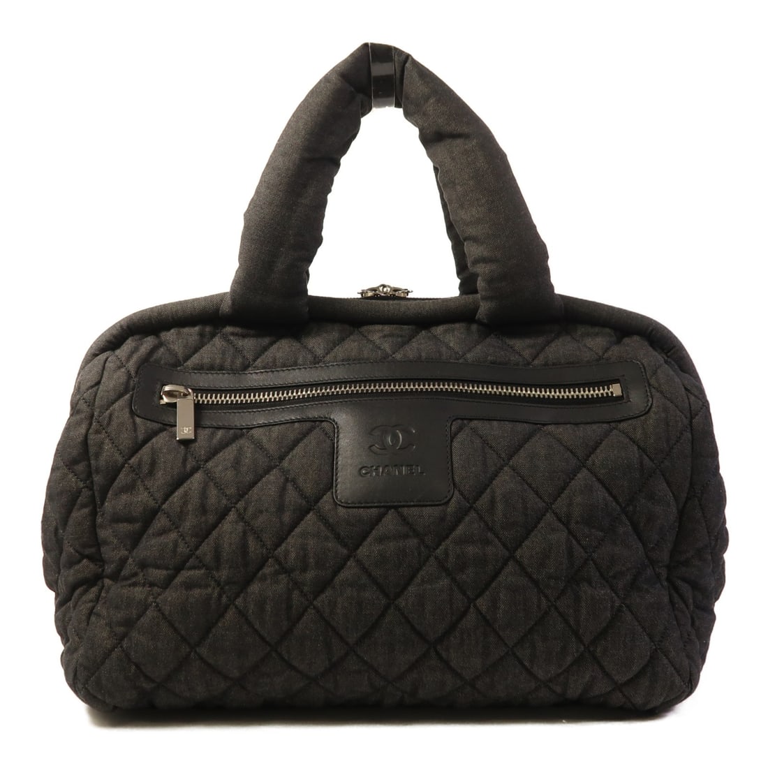 CHANEL Coco Cocoon Black Canvas Shoulder Bag: CHANEL Coco Cocoon Black Canvas Shoulder Bag Elevate your style with this CHANEL Coco Cocoon Shoulder Bag. Crafted from durable black canvas, this shoulder bag combines luxury with practicality. It fe