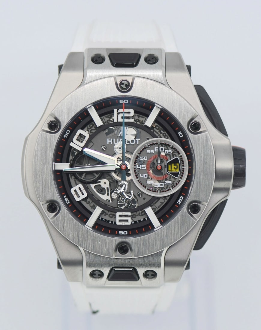 Hublot Big Bang Ferrari Titanium 45mm Automatic Watch with Box and Papers: Hublot Big Bang Ferrari Titanium 45mm Automatic Watch with Box and Papers Introducing the Hublot Big Bang Ferrari Titanium Watch, a stunning blend of luxury and performance. This exquisite wristwatch