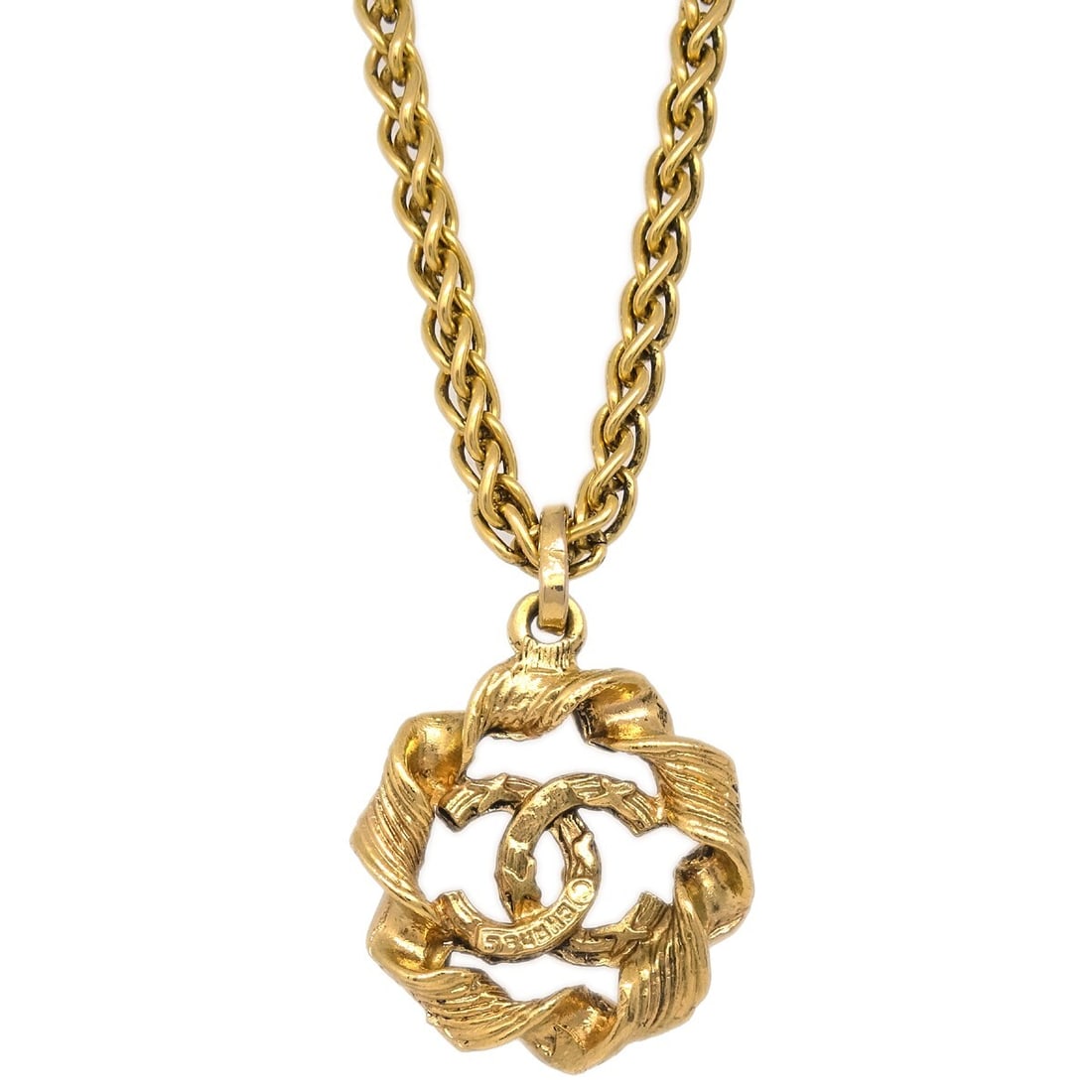 Chanel Gold-Plated Round Charm Pendant Necklace: Chanel Gold-Plated Round Charm Pendant Necklace This stunning Chanel Gold Pendant Necklace features a round charm design, elegantly crafted in gold-plated metal. Ideal for adding a touch of luxury to