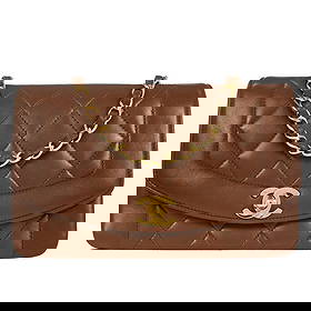 Chanel Brown Lambskin Small Diana Crossbody Shoulder Bag: Chanel Brown Lambskin Small Diana Crossbody Shoulder Bag This exquisite Chanel Brown Lambskin Small Diana Shoulder Bag is a perfect accessory for casual occasions. Crafted from luxurious lambskin, the