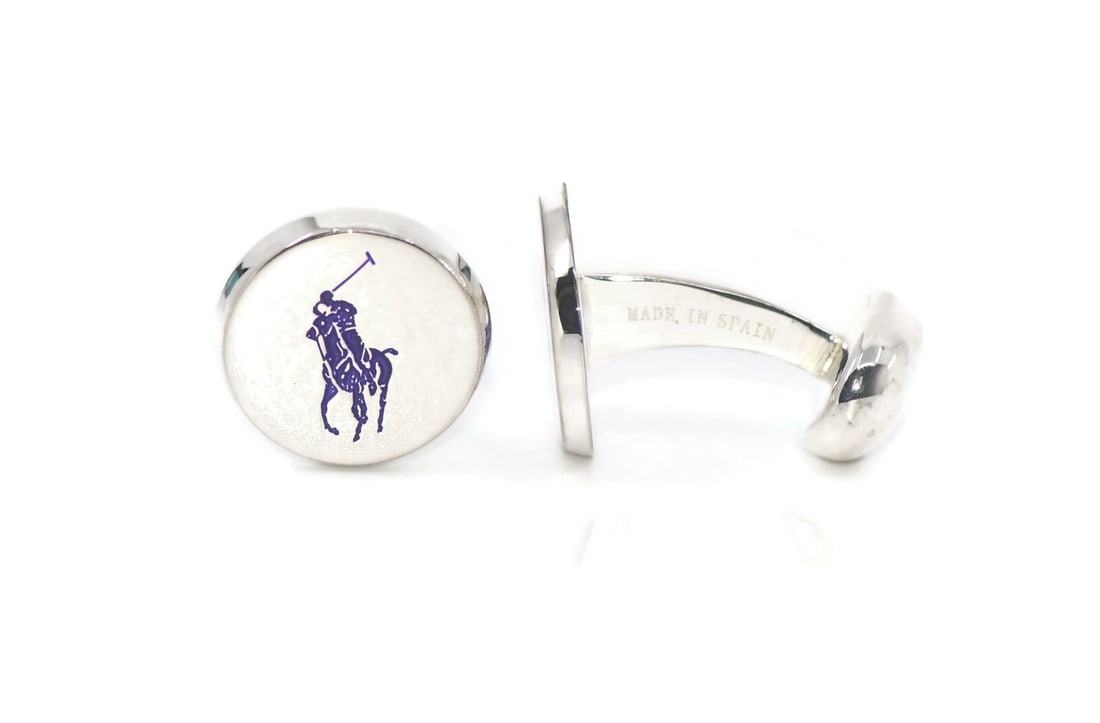 Ralph Lauren Purple Polo Cufflinks 16mm 100% Authentic: Ralph Lauren Purple Polo Cufflinks 16mm 100% Authentic Enhance your formal attire with these Ralph Lauren Purple Polo Cufflinks. Crafted with a striking purple color, these cufflinks are an elegant ac