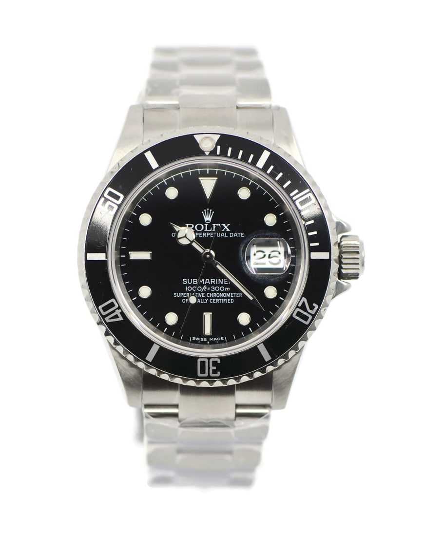 Rolex Submariner 16610 Stainless Steel Automatic Watch with Box: Rolex Submariner 16610 Stainless Steel Automatic Watch with Box This exquisite Rolex Submariner is a pre-owned stainless steel wristwatch, model 16610, known for its iconic design and robust functiona