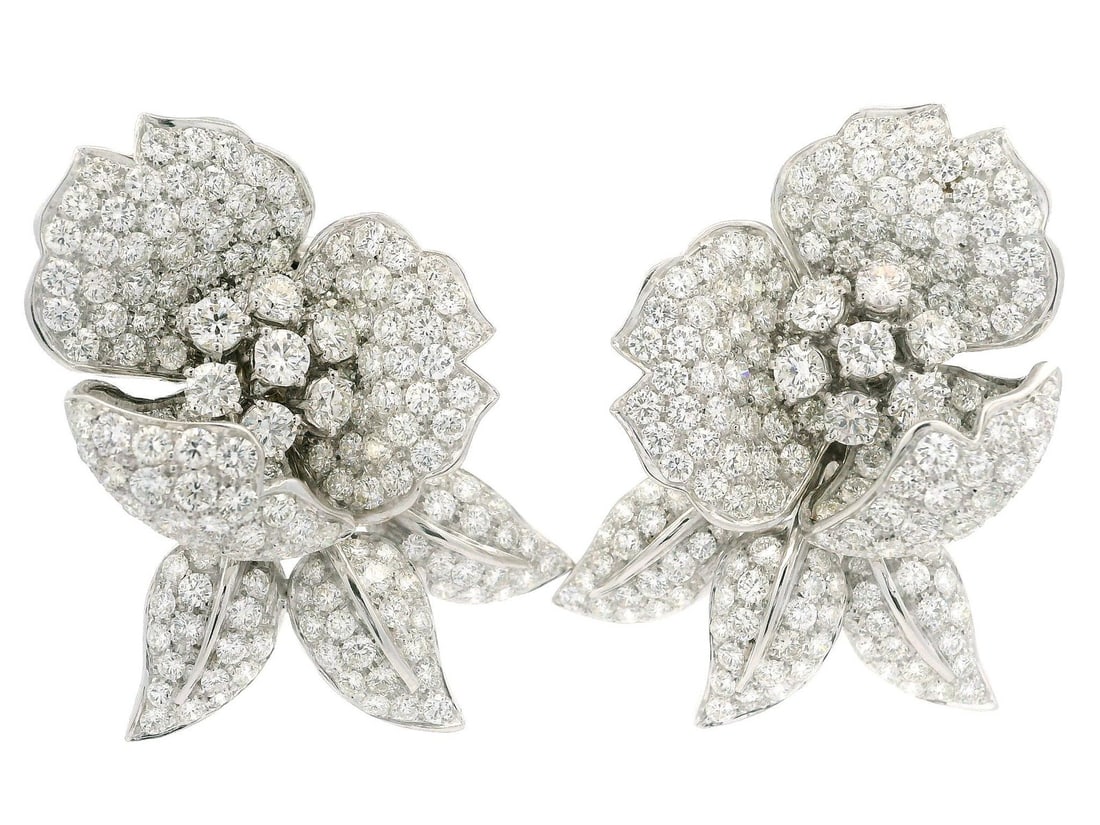 Stunning 18k White Gold 16ctw Round Diamond Flower Omega Earrings: Stunning 18k White Gold 16ctw Round Diamond Flower Omega Earrings Elevate your elegance with these stunning 18k white gold flower-shaped earrings, adorned with an impressive 16ctw of round brilliant