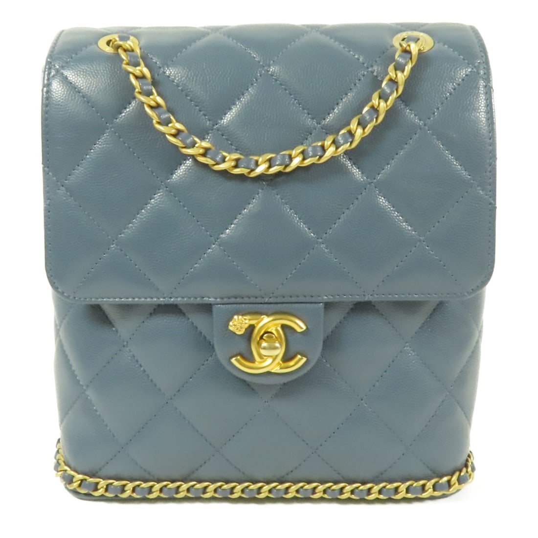 CHANEL CC Rucksack Backpack Blue Calfskin with Gold Hardware: CHANEL CC Rucksack Backpack Blue Calfskin with Gold Hardware This stunning CHANEL rucksack backpack is crafted from high-quality calfskin leather in a striking blue color. With dimensions of 8.3 in