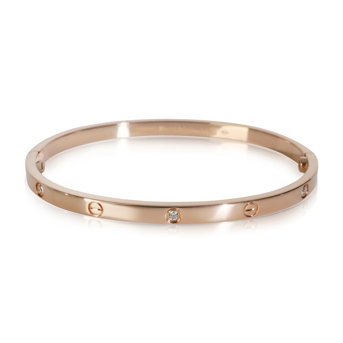 Cartier Small Model Love Bracelet 18k Rose Gold Diamond: Cartier Small Model Love Bracelet 18k Rose Gold Diamond This exquisite Cartier bracelet features a stunning round brilliant diamond, expertly set in 18k rose gold. The small model love bracelet is des