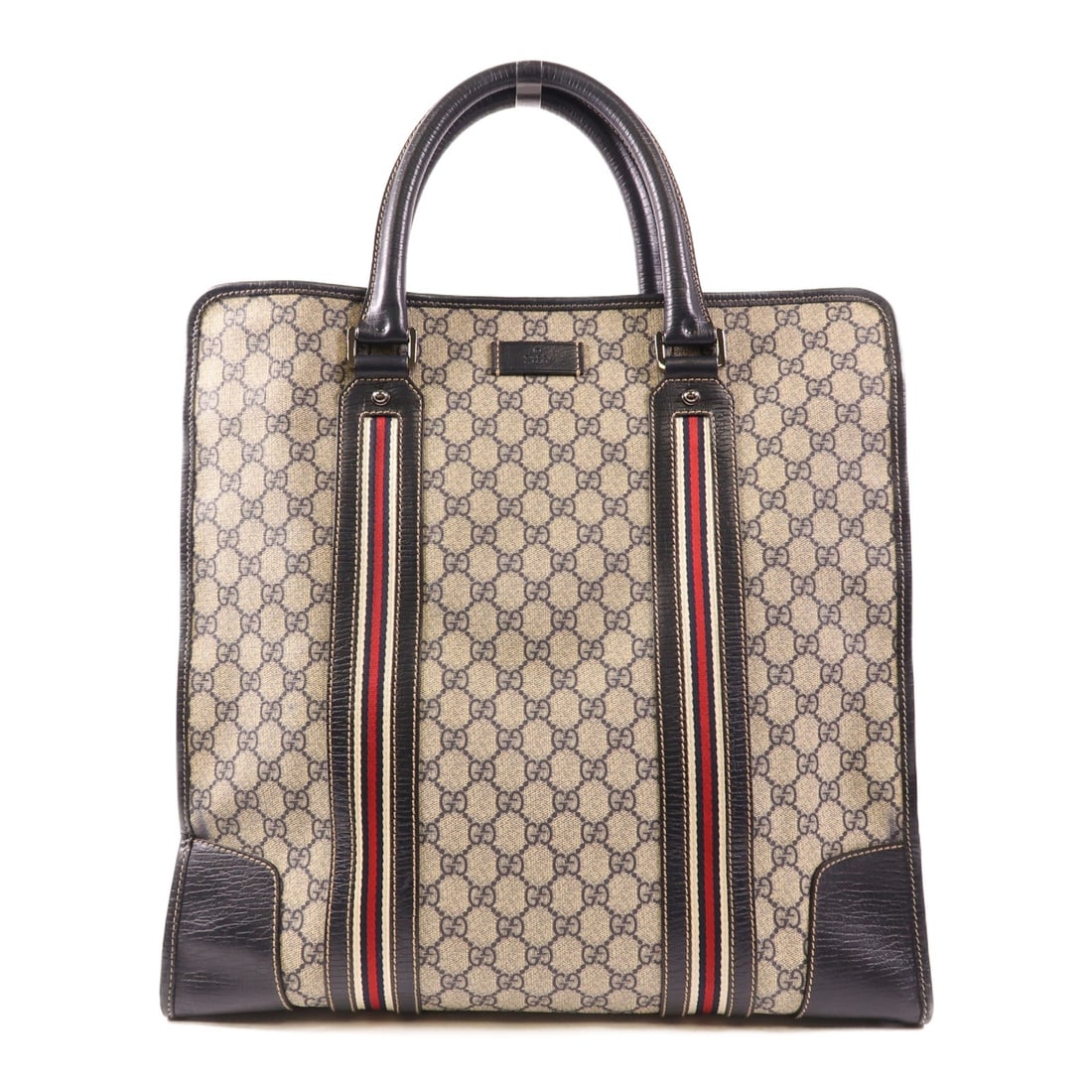 GUCCI GG SHW Beige/Navy Tote Handbag 145843 PVC Coated Canvas: GUCCI GG SHW Beige/Navy Tote Handbag 145843 PVC Coated Canvas Elevate your style with this GUCCI GG SHW Tote Bag, expertly crafted from durable PVC coated canvas. This handbag features a chic beige ex