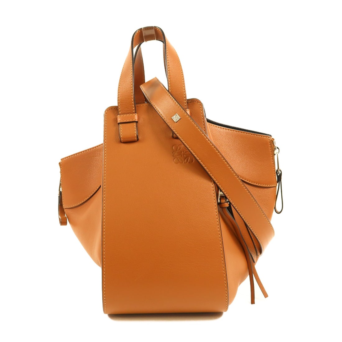 LOEWE Brown Hammock 2 Way Shoulder Bag Calfskin Leather: LOEWE Brown Hammock 2 Way Shoulder Bag Calfskin Leather Introducing the LOEWE Hammock 2 Way Shoulder Bag, a stylish accessory crafted from high-quality calfskin leather in a rich brown hue. This versa