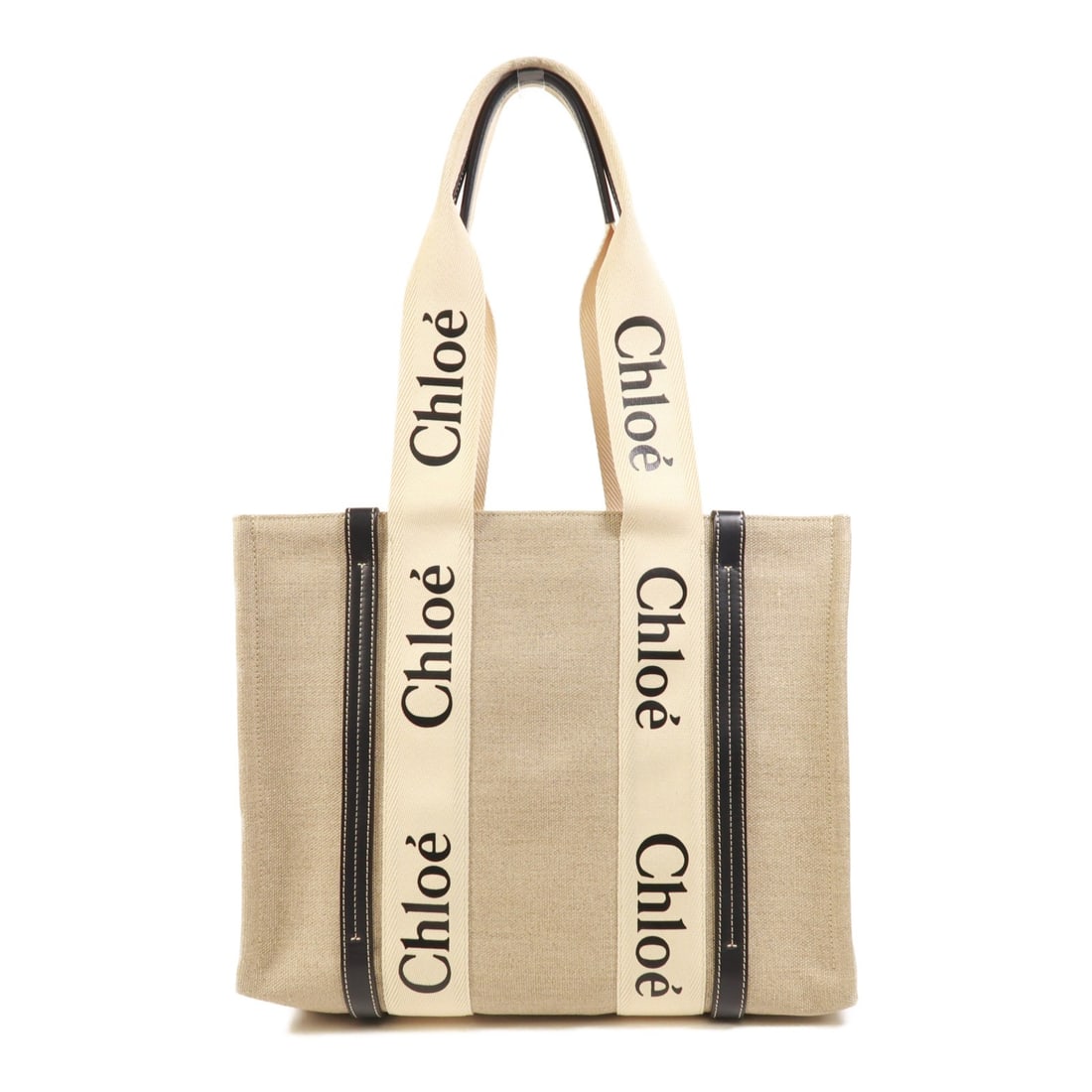 Chloe Woody Medium Beige Canvas Tote Bag Made in France: Chloe Woody Medium Beige Canvas Tote Bag Made in France Introducing the Chloe Woody Shoulder Tote Bag in Medium size, crafted from durable canvas material in a sophisticated beige hue. This stylish to