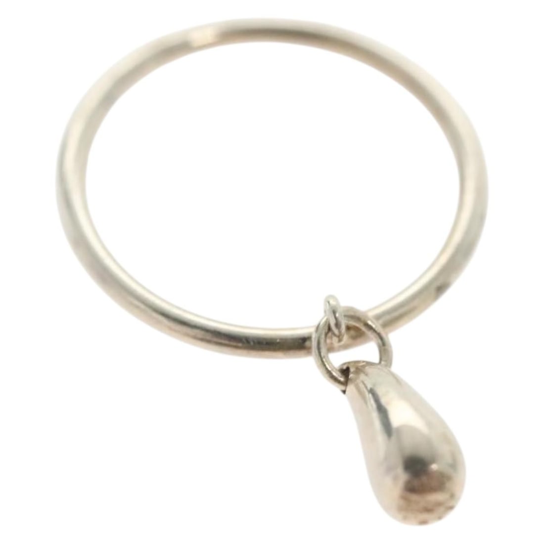 Tiffany & Co. Teardrop Ring in Ag925 Silver Authentic: Tiffany & Co. Teardrop Ring in Ag925 Silver Authentic This authentic Tiffany & Co. teardrop ring is crafted from high-quality sterling silver (Ag925) and showcases a stunning teardrop design. With a J