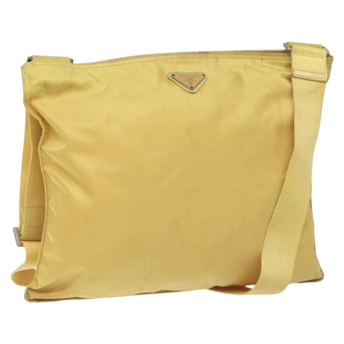 PRADA Yellow Nylon Shoulder Bag Made in Italy Auth 127873: PRADA Yellow Nylon Shoulder Bag Made in Italy Auth 127873 This authentic PRADA shoulder bag is crafted from durable nylon in a vibrant yellow color. The bag features a spacious interior with dimension