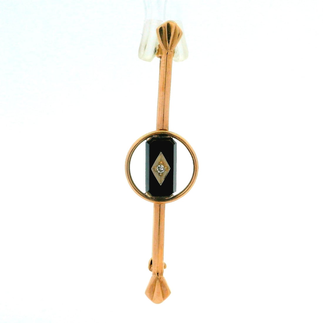 Vintage 10k Yellow Gold Black Onyx Diamond Bar Pin: Vintage 10k Yellow Gold Black Onyx Diamond Bar Pin This exquisite vintage bar pin features a stunning combination of natural black onyx and a sparkling diamond. The centerpiece is a round brilliant di