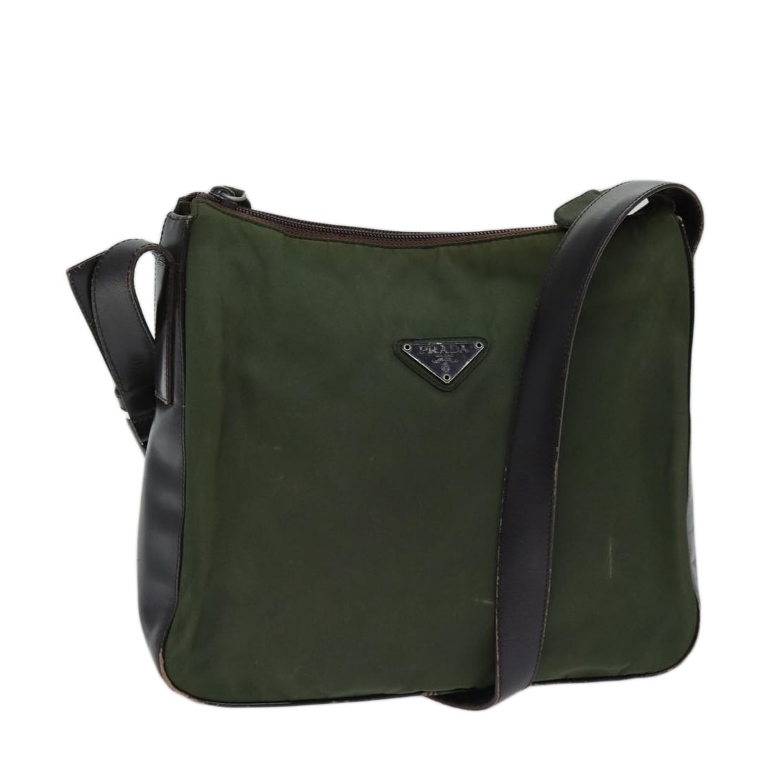 Authentic PRADA Khaki Nylon Shoulder Bag Made in Italy: Authentic PRADA Khaki Nylon Shoulder Bag Made in Italy This authentic PRADA shoulder bag is crafted from durable khaki nylon, showcasing a stylish and practical design for everyday use. The bag featur