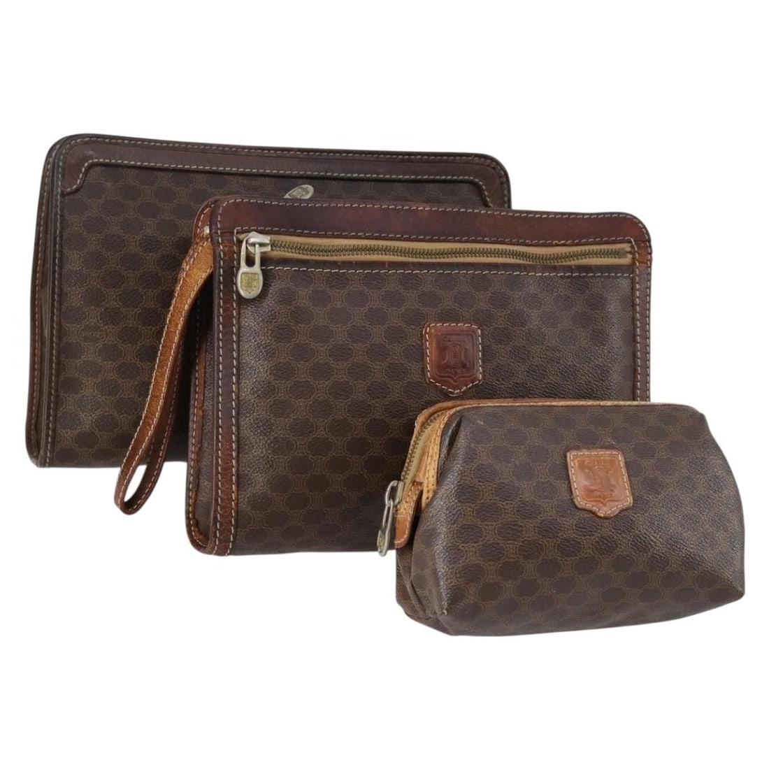 CELINE Macadam Canvas Clutch Bag PVC Leather Brown 3 Piece Set: CELINE Macadam Canvas Clutch Bag PVC Leather Brown 3 Piece Set This CELINE Macadam Canvas Clutch Bag is a stylish accessory crafted from durable PVC leather with a classic brown color. The clutch bag