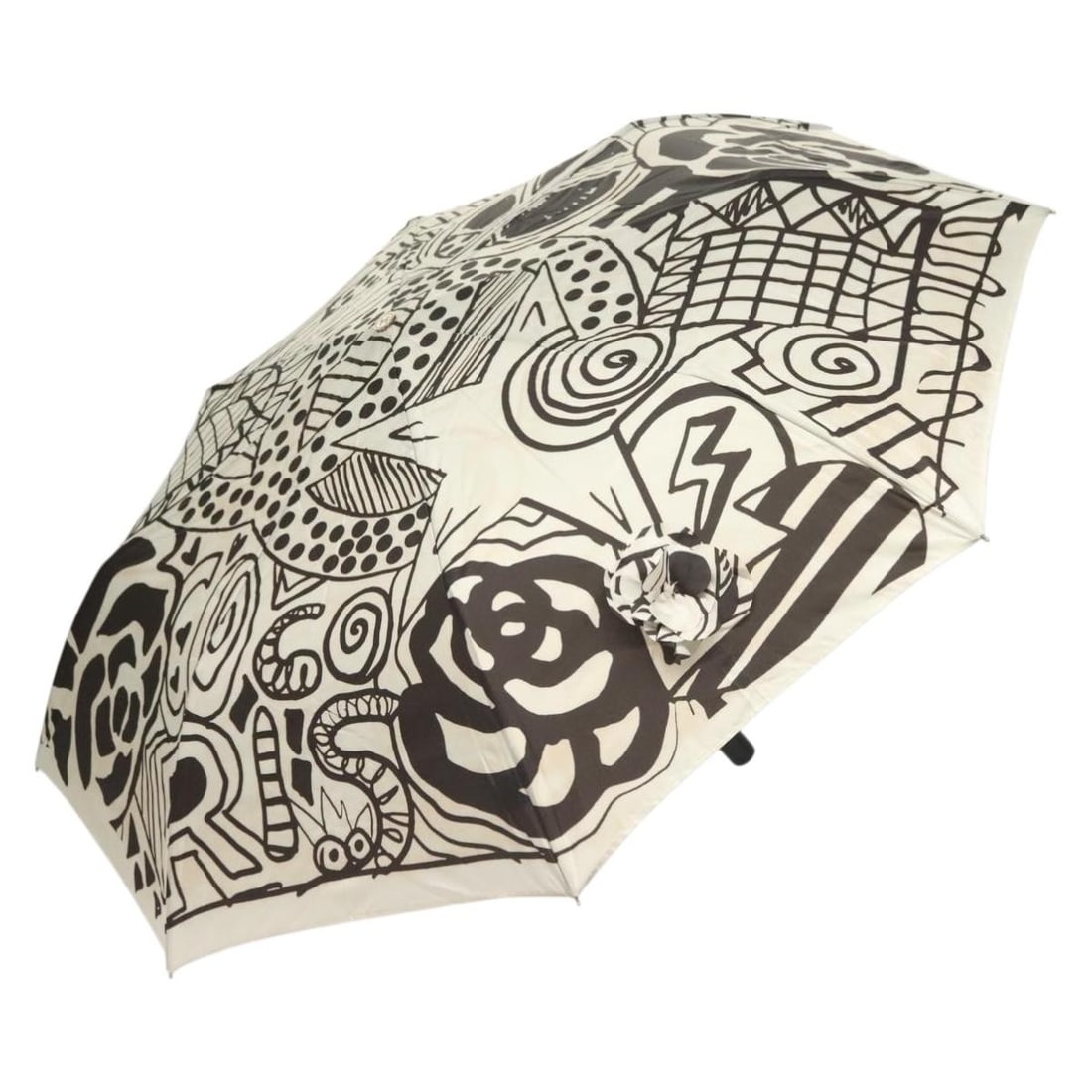 CHANEL Folding Umbrella White Black Nylon Stylish Design Auth BA2522: CHANEL Folding Umbrella White Black Nylon Stylish Design Auth BA2522 This authentic CHANEL folding umbrella features a stylish design in a classic white and black color combination. Crafted from durab
