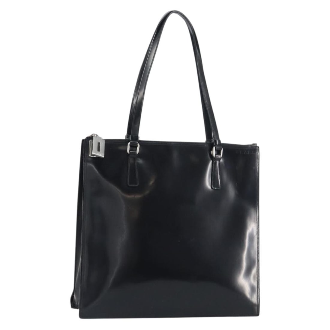 PRADA Black Silver Enamel Tote Bag with Guarantee Card: PRADA Black Silver Enamel Tote Bag with Guarantee Card This authentic PRADA tote bag showcases a sleek black and silver enamel exterior, combining elegance with practicality. Measuring approximately 1