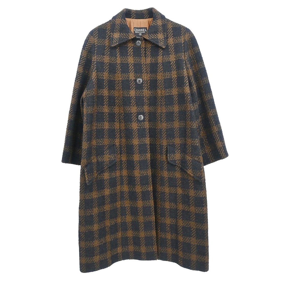 Chanel Vintage Brown Coat 96A Long Sleeve Collarless Size 40: Chanel Vintage Brown Coat 96A Long Sleeve Collarless Size 40 This vintage Chanel coat is a stylish long jacket designed for casual occasions. Made with a blend of 54% wool, 43% acrylic, and 3% nylon,