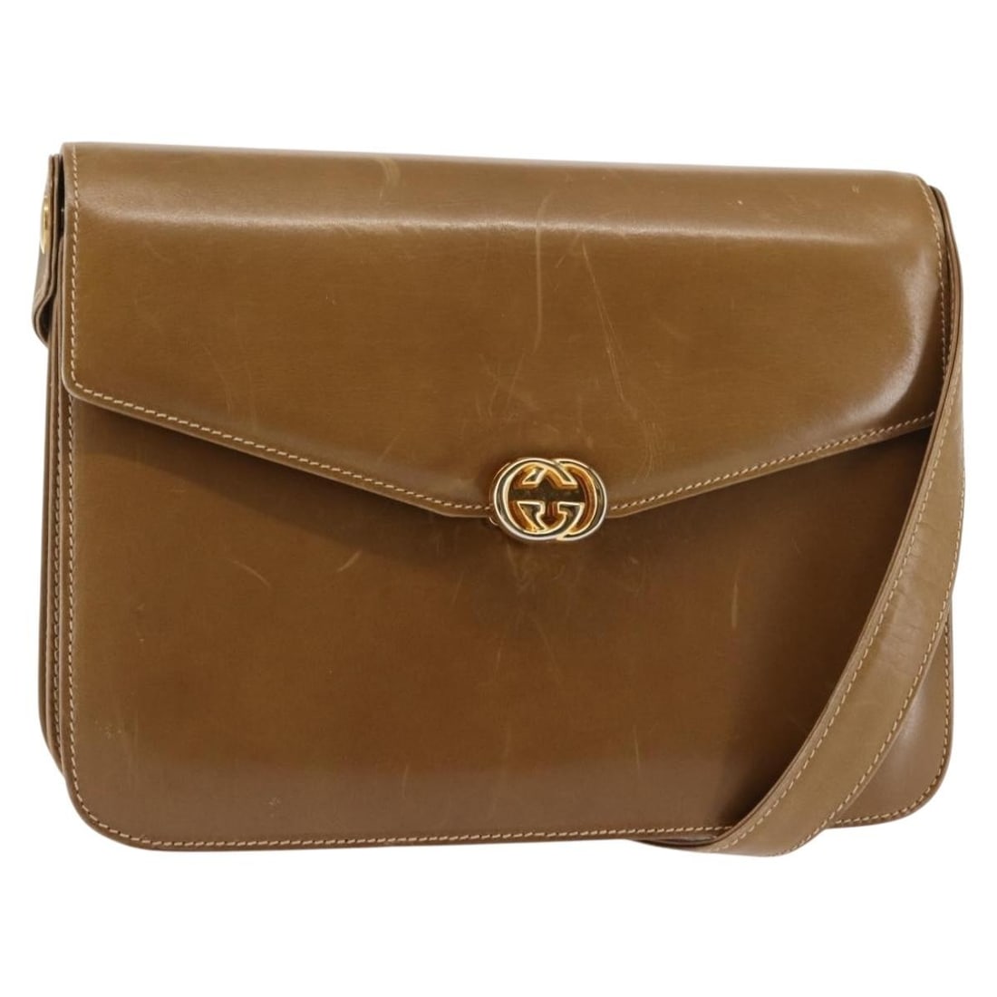 GUCCI Brown Leather Shoulder Bag with Gold Accents Auth BA6561: GUCCI Brown Leather Shoulder Bag with Gold Accents Auth BA6561 This GUCCI shoulder bag combines luxury and practicality with its elegant brown leather exterior accented by gold tones. The bag is desig