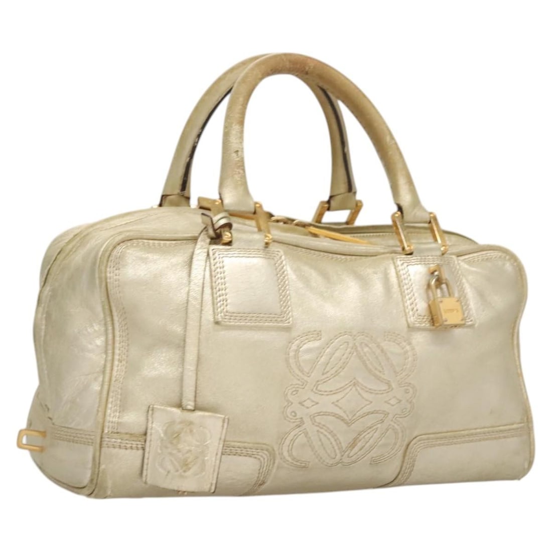 LOEWE Anagram Amazona 28 Gold Leather Hand Bag Auth 119534: LOEWE Anagram Amazona 28 Gold Leather Hand Bag Auth 119534 Discover the elegance of the LOEWE Anagram Amazona 28 Hand Bag, crafted from luxurious gold leather. This stylish handbag measures approximat