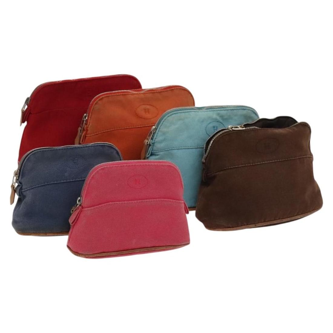 HERMES Bolide Canvas Pouch Set of 6 Orange Brown Red: HERMES Bolide Canvas Pouch Set of 6 Orange Brown Red This HERMES Bolide Pouch in a vibrant blend of orange, brown, and red canvas is a stylish accessory that exemplifies luxury craftsmanship from Fran