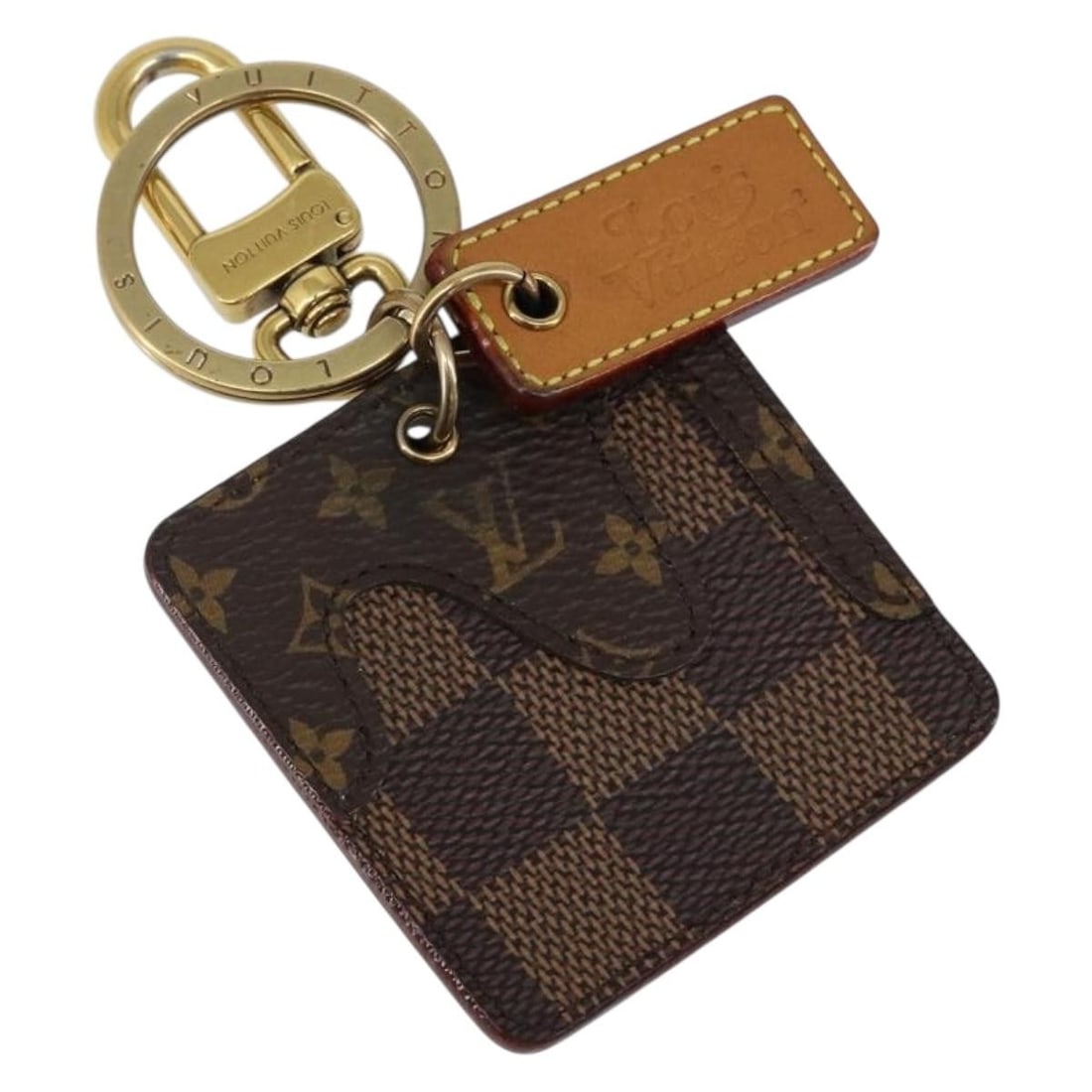 Louis Vuitton Damier Giant Monogram Charm MP2713 Brown Authentic: Louis Vuitton Damier Giant Monogram Charm MP2713 Brown Authentic This authentic Louis Vuitton Porte Cles Damier Giant Monogram Charm showcases a stylish brown color with a unique design. Crafted in Fr