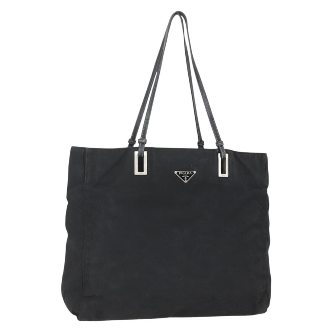 PRADA Black Silver Nylon Tote Bag Auth 157633 Italy: PRADA Black Silver Nylon Tote Bag Auth 157633 Italy This PRADA Tote Bag is a stylish and functional accessory crafted from durable nylon. The bag features a sleek black and silver exterior, making it