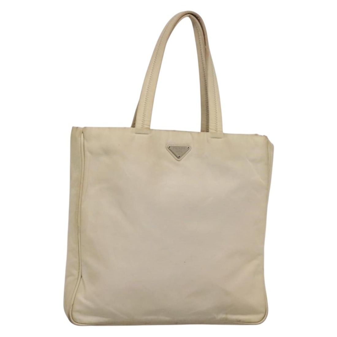 PRADA Beige Silver Nylon Tote Bag with Guarantee Card: PRADA Beige Silver Nylon Tote Bag with Guarantee Card This authentic PRADA tote bag is crafted from durable nylon in a stylish beige and silver color combination. With dimensions of approximately 13.4