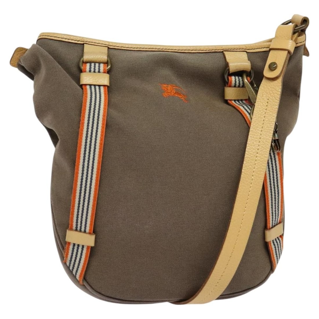 BURBERRY Blue Label Brown Canvas Shoulder Bag Made in Japan: BURBERRY Blue Label Brown Canvas Shoulder Bag Made in Japan This Burberry Blue Label Shoulder Bag showcases a stylish and practical design made from durable canvas. The rich brown exterior offers a ve