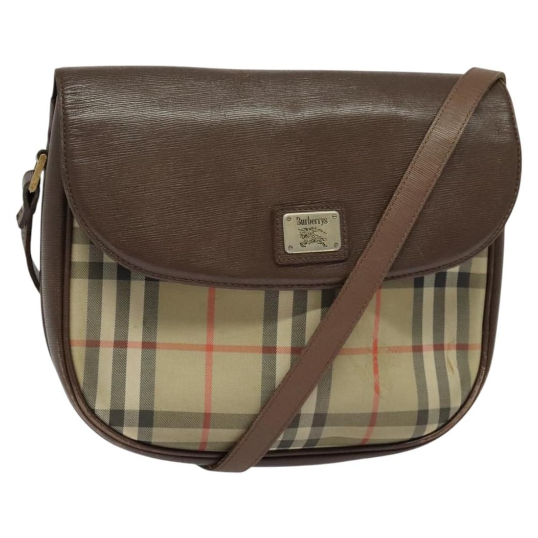 Burberrys Nova Check Beige Gold Canvas Shoulder Bag Auth: Burberrys Nova Check Beige Gold Canvas Shoulder Bag Auth This Burberrys Nova Check Shoulder Bag is a stylish accessory crafted from durable canvas in a sophisticated beige and gold color scheme. Desig