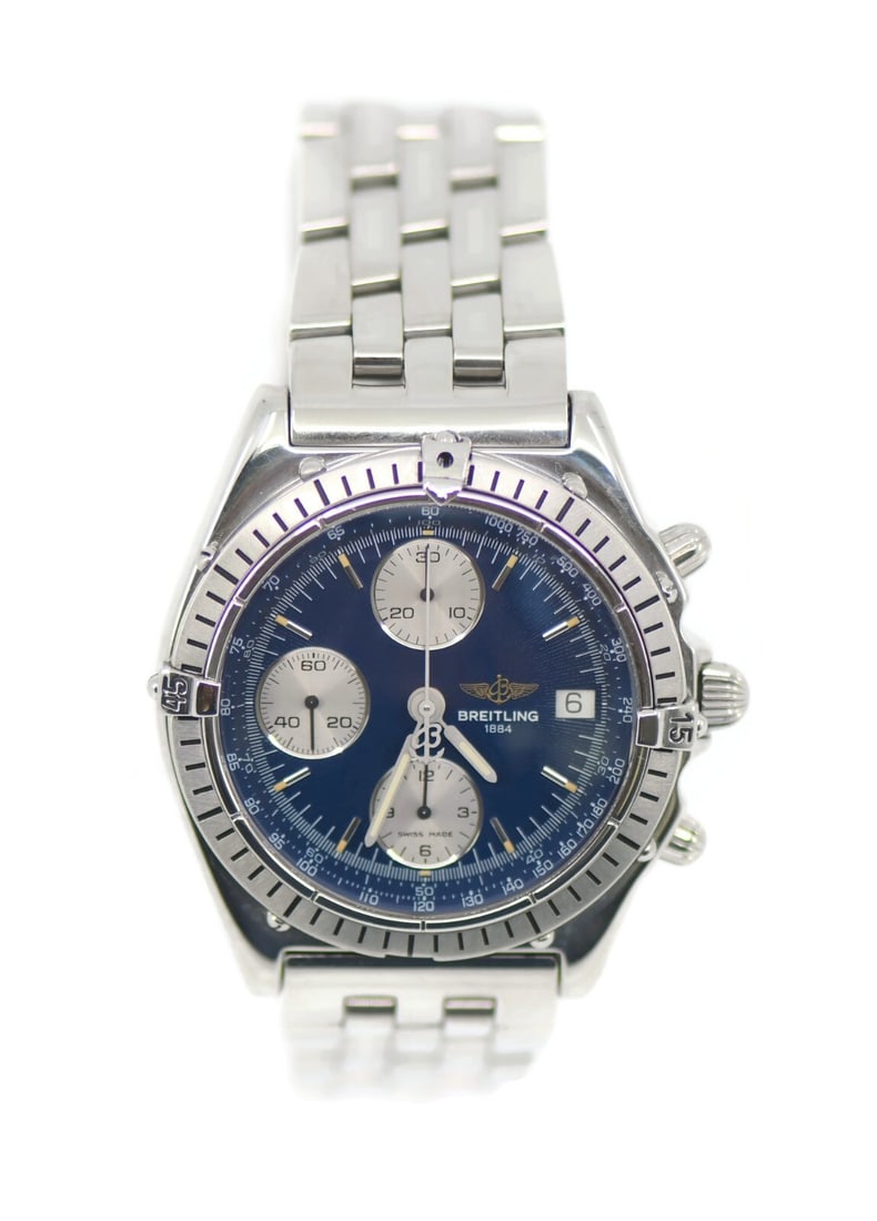 Breitling Chronomat A13047 Stainless Steel Automatic Watch with Box and Papers: Breitling Chronomat A13047 Stainless Steel Automatic Watch with Box and Papers This Breitling Chronomat wristwatch is a stunning timepiece characterized by its blue dial and robust stainless steel con