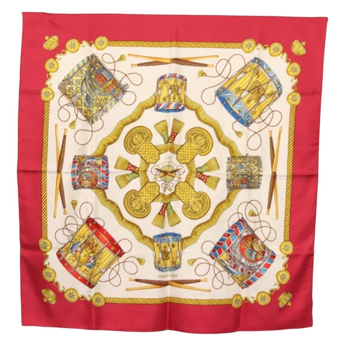 HERMES Carre 90 Scarf Les Tambours Silk Red Made in France: HERMES Carre 90 Scarf Les Tambours Silk Red Made in France Elevate your accessory collection with this stunning HERMES Carre 90 Scarf, featuring a vibrant red hue perfect for any season. Crafted from