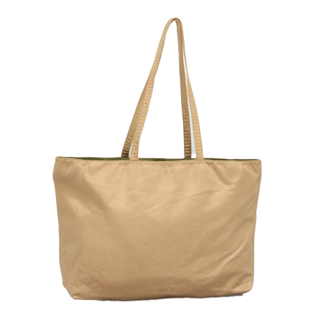 PRADA Gold Tone Satin Tote Bag Made in Italy: PRADA Gold Tone Satin Tote Bag Made in Italy This PRADA tote bag is a luxurious accessory made in Italy, crafted from satin with a stunning gold tone finish. The tote features a spacious design, perfe