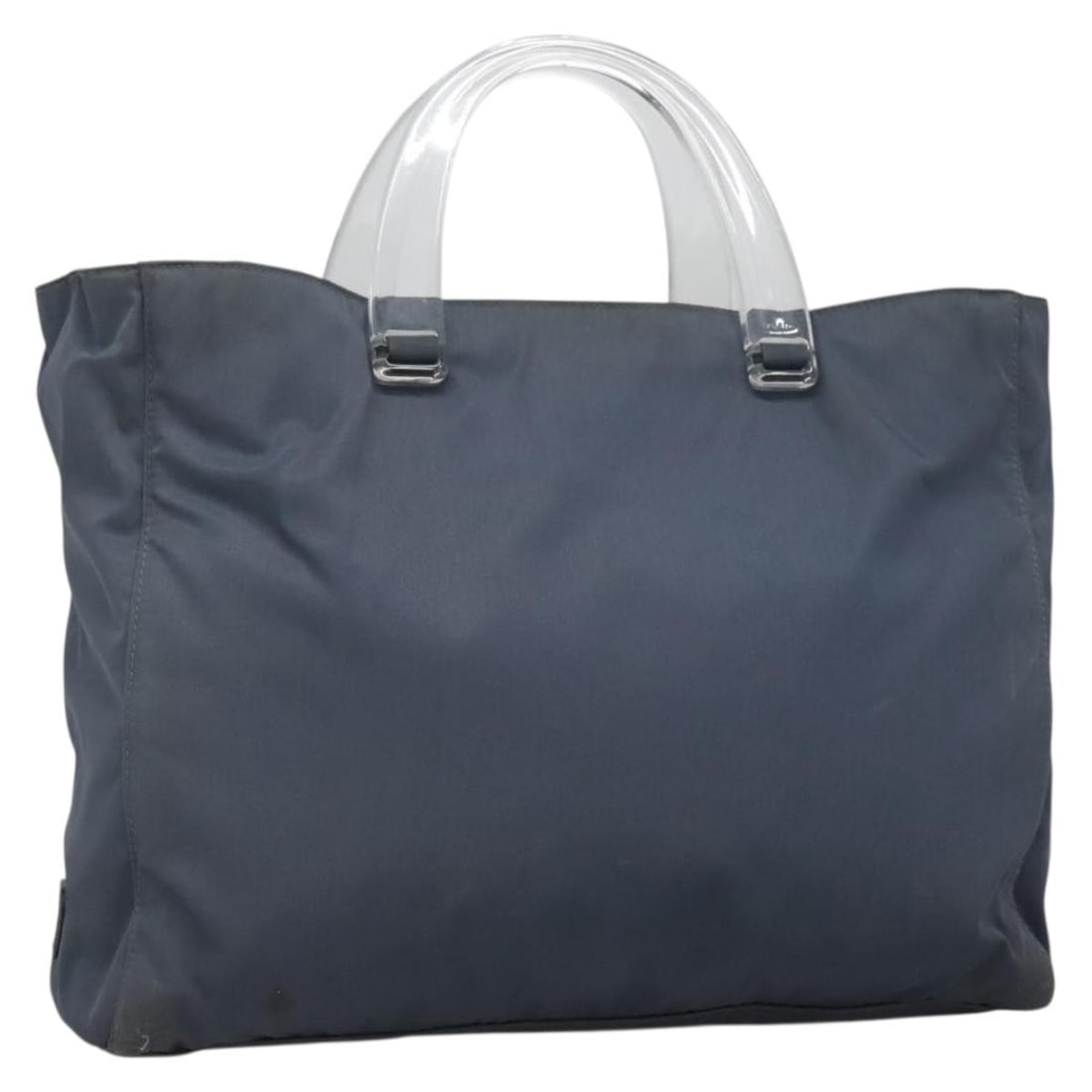 PRADA Gray Silver Nylon Hand Bag Made in Italy: PRADA Gray Silver Nylon Hand Bag Made in Italy This PRADA hand bag is a stylish accessory crafted from durable nylon, featuring a chic gray and silver exterior. Designed for practicality, it boasts ge