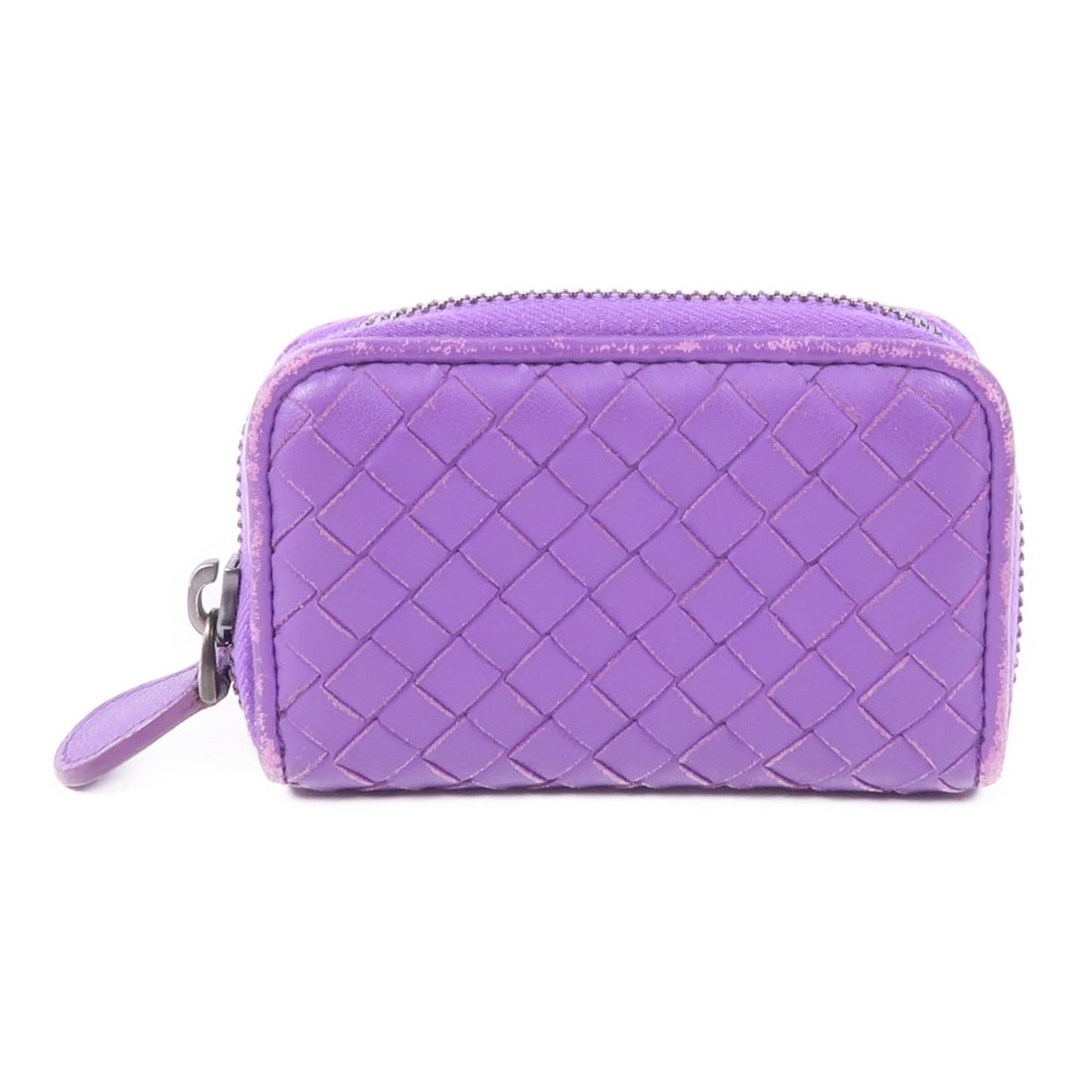 Bottega Veneta Purple Intrecciato Leather Coin Purse 114075 V4651: Bottega Veneta Purple Intrecciato Leather Coin Purse 114075 V4651 This Bottega Veneta coin purse showcases the brand's iconic Intrecciato leather in a striking purple hue. Designed for both style and