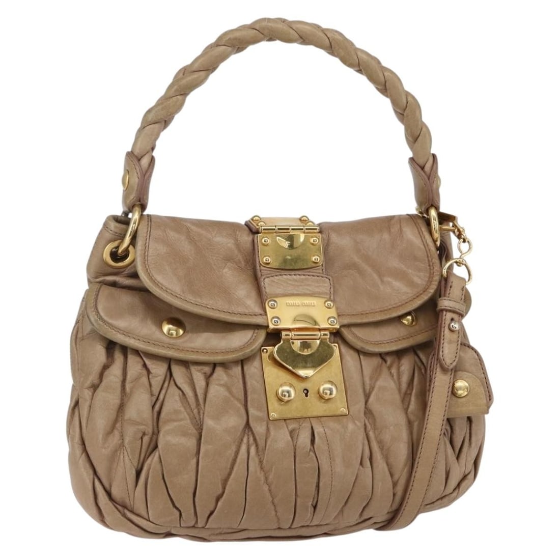 Miu Miu Matelasse Leather Hand Bag Beige Gold Auth 2way: Miu Miu Matelasse Leather Hand Bag Beige Gold Auth 2way Embrace luxury with the Miu Miu Matelasse Hand Bag, an exquisite accessory crafted from high-quality leather. This stylish bag features a sophis
