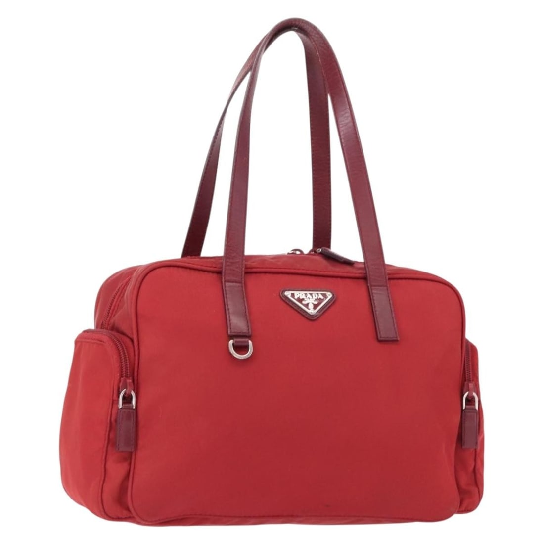 PRADA Red Nylon Tote Bag Authentic 153863 Italy: PRADA Red Nylon Tote Bag Authentic 153863 Italy Elevate your accessory collection with this authentic PRADA Tote Bag, crafted in Italy from durable nylon. The striking red and silver exterior showcase