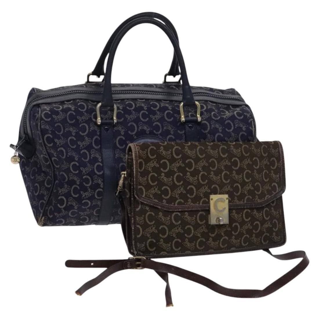 CELINE C Sulky Boston Leather Shoulder Bag Brown Navy 2Set: CELINE C Sulky Boston Leather Shoulder Bag Brown Navy 2Set This authentic CELINE C Sulky Boston Shoulder Bag is crafted from high-quality leather in a striking combination of brown and navy. It featur